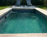Your backyard oasis: a seasonal pool that transforms into a warm and delightful hot tub 104 degrees, perfect for a seasonal soak under the stars